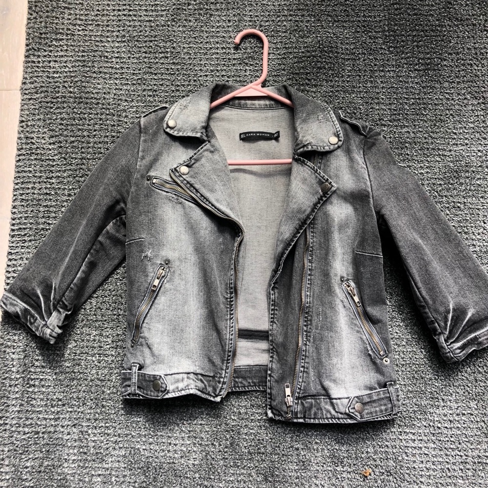 A blackish jean jacket
